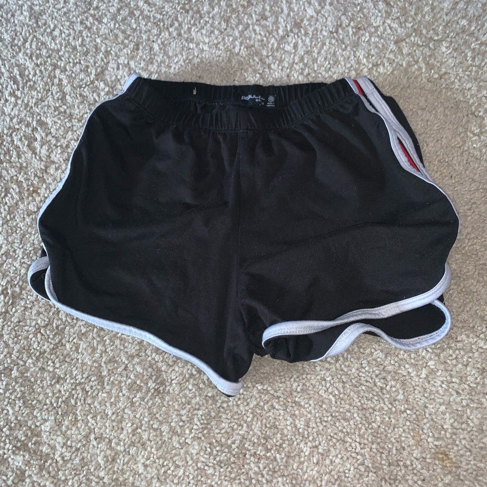 black shirt shorts with red stripe